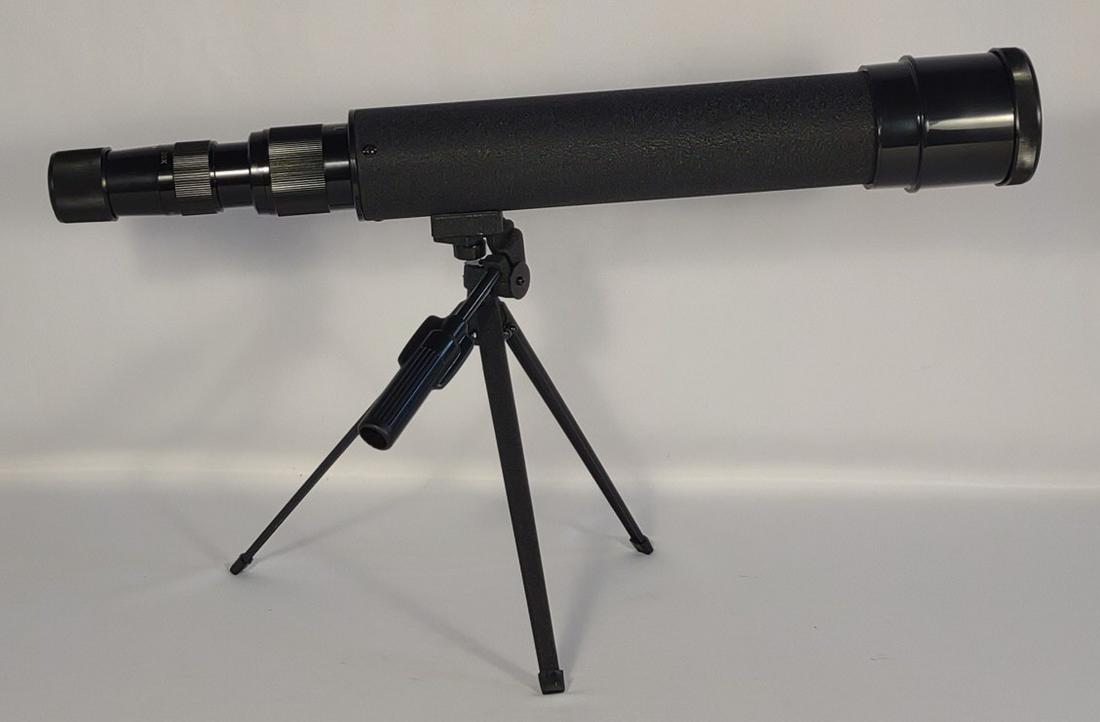Bushnell Sportview 20-60x60mm Spotting Scope: Includes hard shell case and lens covers. Great condition. Label of case is pealing slightly. Includes tripod. Model # 78-2061