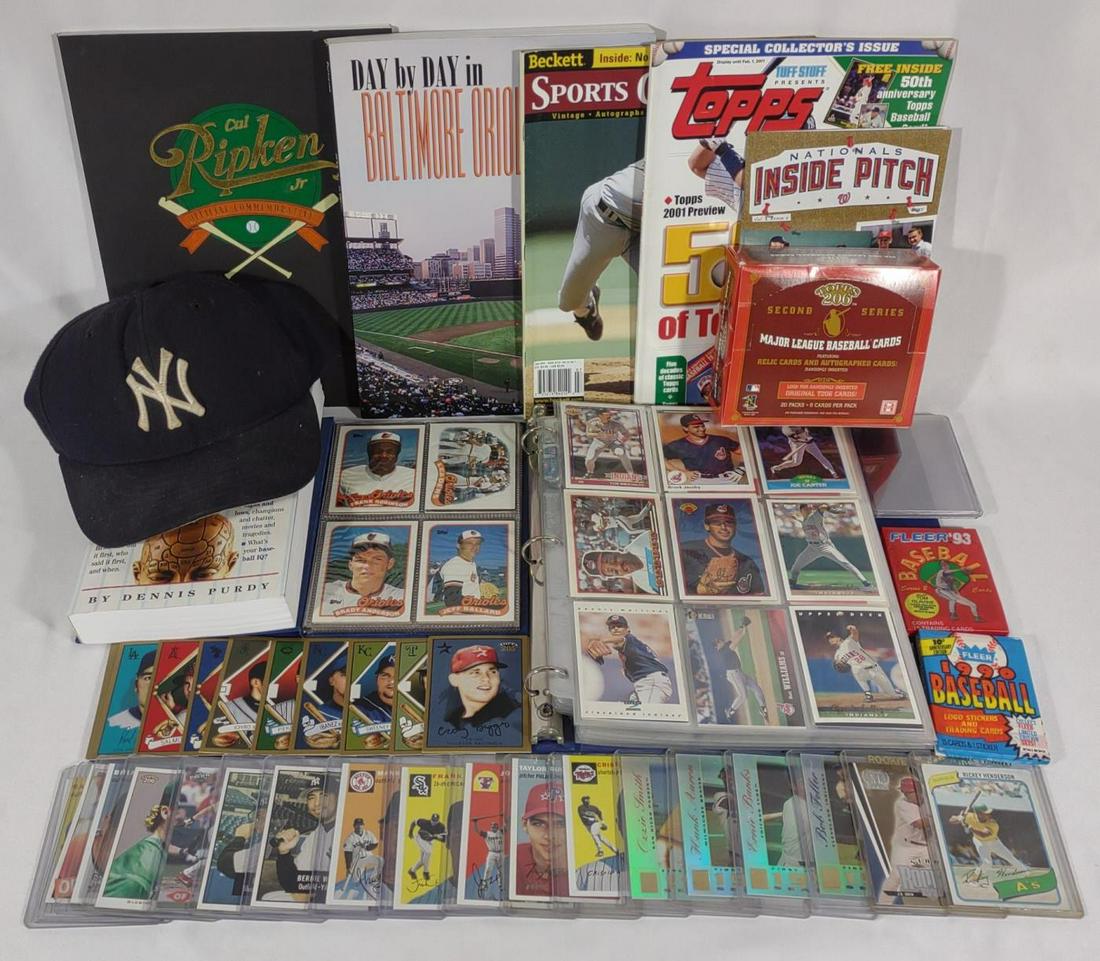 Late 90s-2000s Baseball Cards, Magazines & Hat: Includes topps, Upper deck , fleer, yankees hat (worn), an album of baseball cards, some rookie cards, baseball related magazines and books.