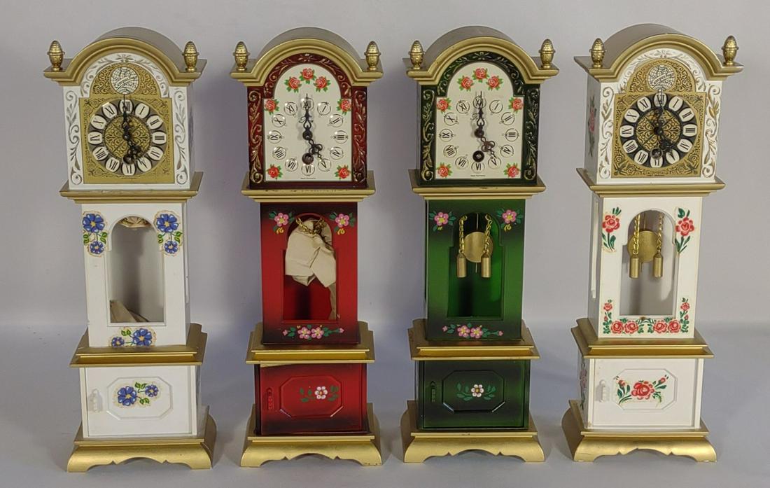 4 Vintage Florn Mini Grandfather Clocks w/ Boxes: 4 mini grandfather clocks made by Florn. Each includes their original box.