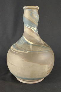 Niloak Marked Mission Swirl Pottery Bottle Vase: Niloak 1st art mark present on bottom. Authentic niloak pottery art bottle shaped vase. Mission swirl design. 8.5" tall.