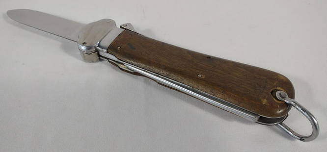 WWII German Paratrooper Gravity Knife: In working conditon. WW2 German Luftwaffe paratrooper gravity knife made by Solingen. Blade is marked with "Solingen". Lock is stamped "257". The pick has the Waffenamt mark with an eagle over number