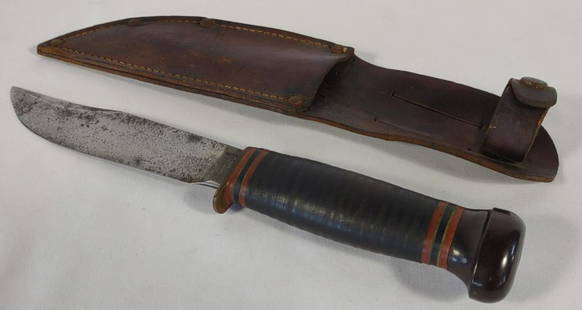 Marbles Knife w/ Leather Sheath: Blade is marked "Marbles, Gladstone, Mich, USA.". Blade length is 5". Knife length is 9".