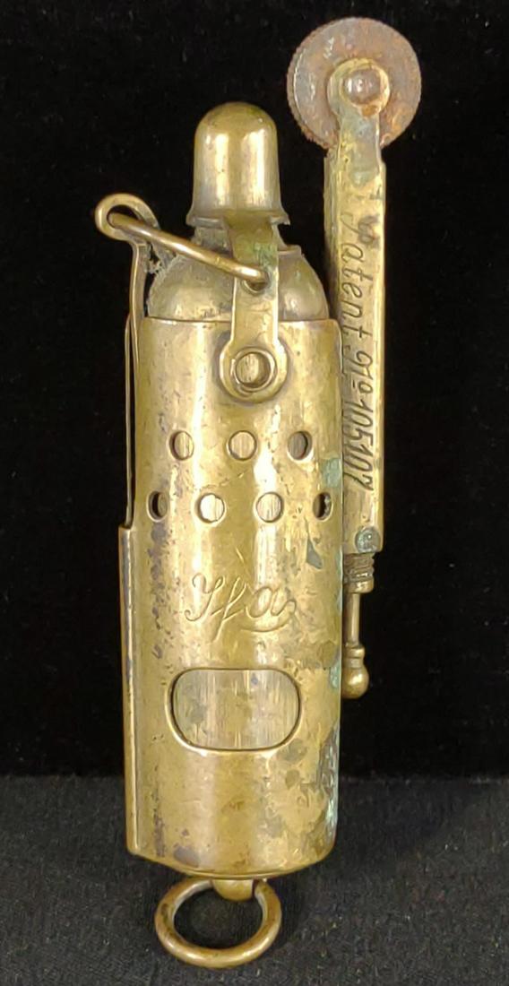 WWI IMCO Brass Trench Art Lighter: Made in Austria. Pat no. 105107. Made by IMCO. Lighter slides up and down, which opens and closes the wick. Spark wheel does not spin.