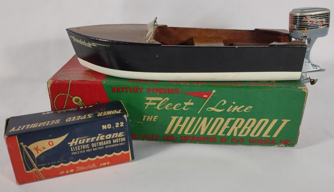 Vtg. Toy Boat & Motor, Fleet Line & Hurricane #22: Vintage Fleet Line "The Thunderbolt" wooden toy model boat with K&O Hurricane no. 22 electric outboard motor. Both the boat and outboard includes their original boxes. Paint is worn on the outboard mo