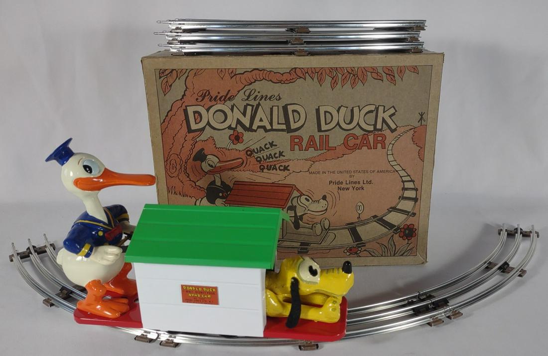 Pride Lines Donald Duck Rail Car #1107 w/ Box: 1989 Pride Lines Donald Duck Rail Hand Car, #1107 toy train with track, original box, and Pride Lines LTD paperwork. Made by Pride Lines Ltd, New York.