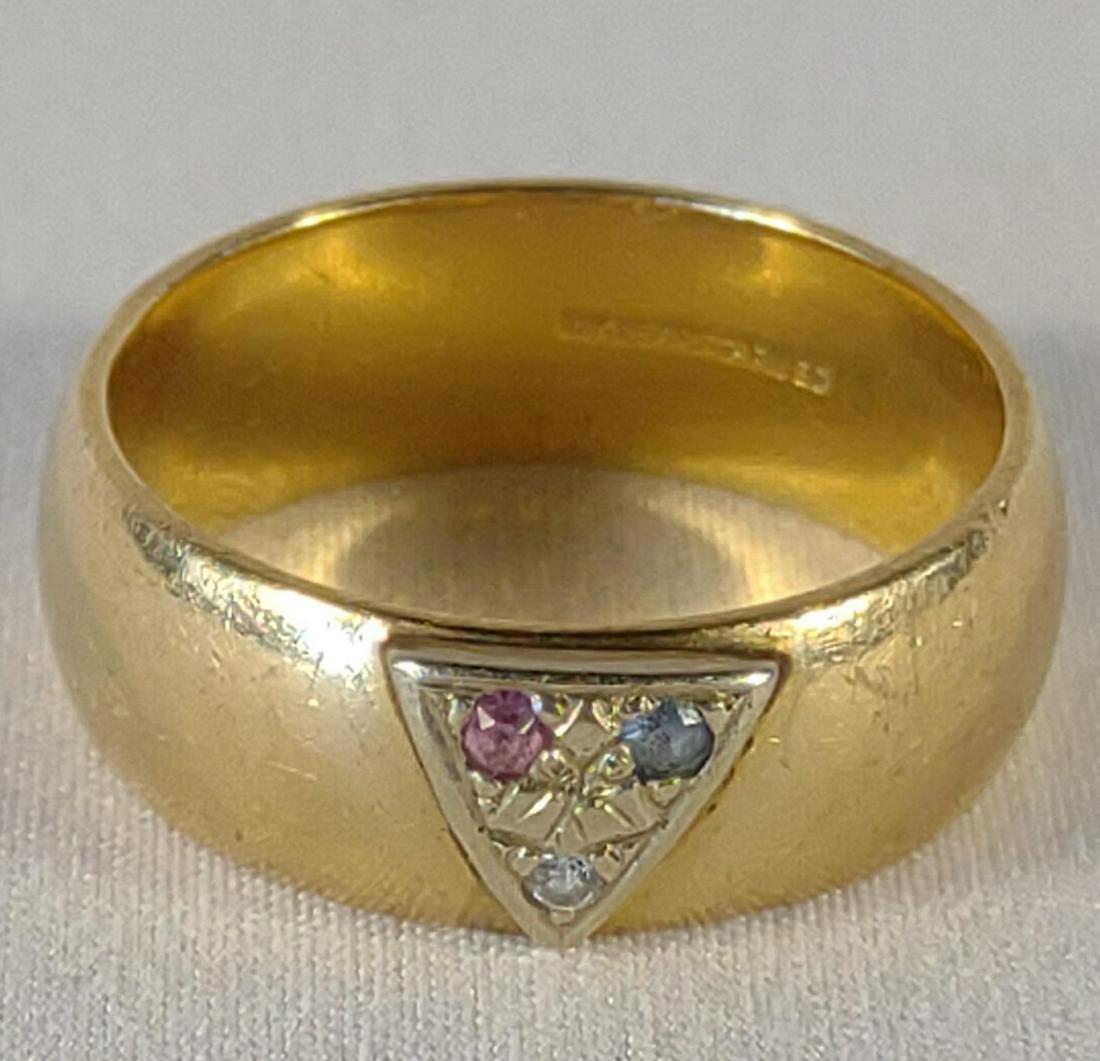 14K Gold Diamond, Aquamarine & Tourmaline Ring: 9.57 grams total weight. 14 karat yellow gold band with diamond, aquamarine and pink tourmaline accent stones. Tested. Ring size: 10.5. Marked "14K Artcarved".