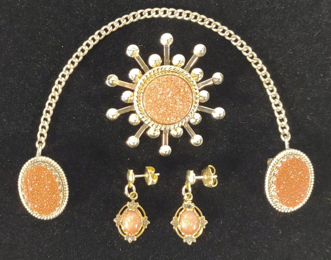Vintage Goldstone Jewelry Suite Set: Matching goldstone jewelry suite with pair of earrings, brooch, and sweater guard.