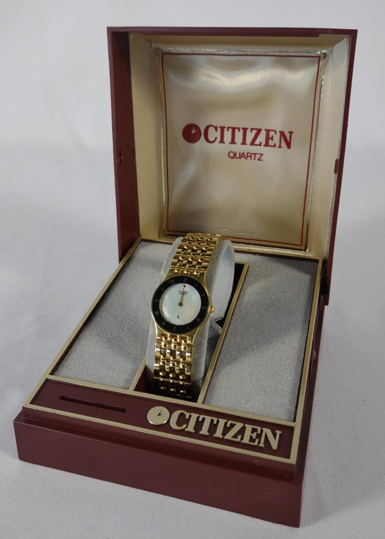 Citizen Quartz Gold Tone Womens Watch w/ Box: Includes original Citizen Watch Co. box with manual and pamphlets. Tested and works. Battery powered. Face of watch is marked 2200-242031. Mother of pearl dial center.