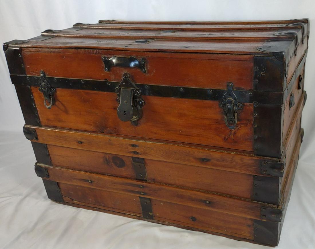 Antique Flat Top Wood & Metal Steamer Trunk: Wood with black banded metal . No key, unlocked. See images for measurement. Handles are missing. (If shipping, please self arrange for 3rd party shipment services on this item. Due to size, UPS Pack 