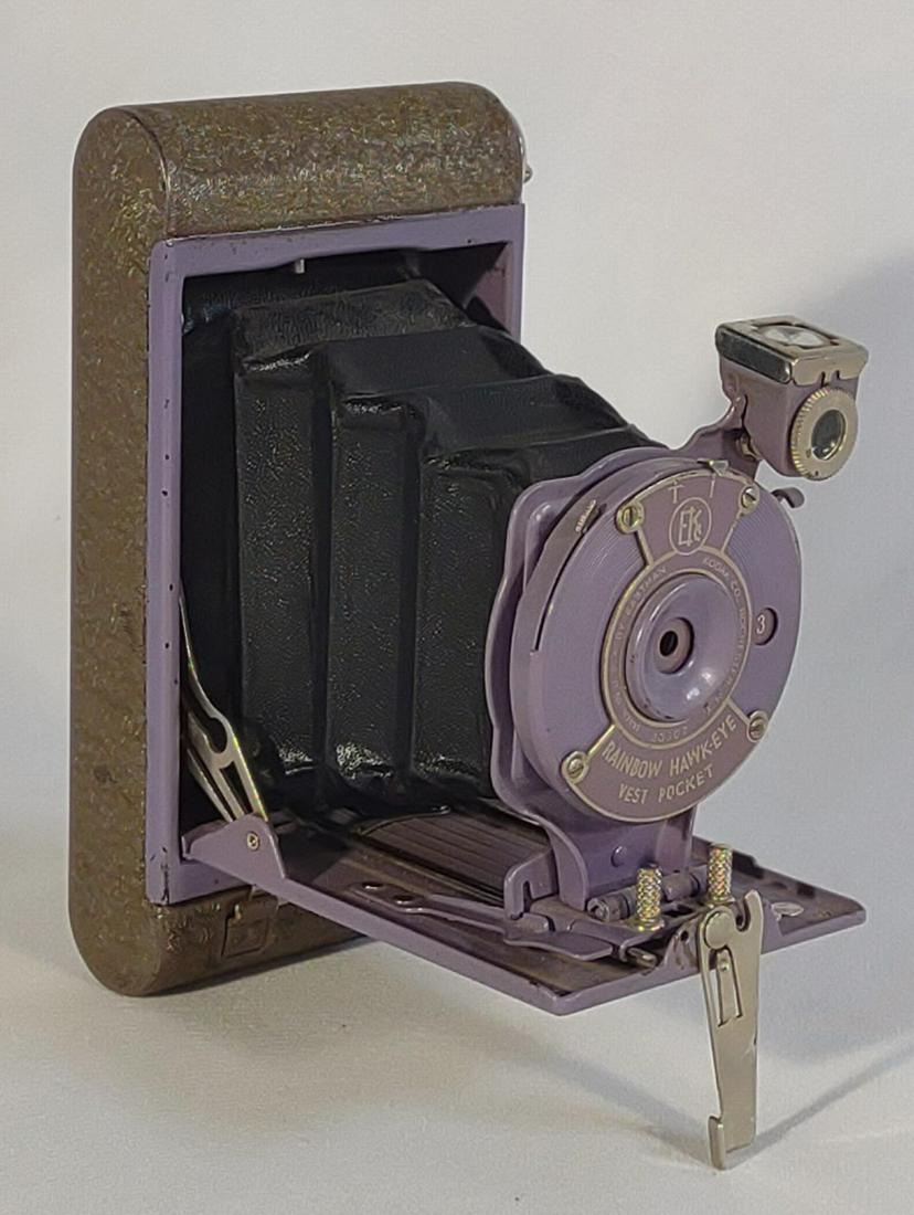 Lavender Rainbow Hawkeye Vest Pocket Camera: Lavender colored Rainbow Hawkeye Vest Pocket camera by Eastman Kodak Co. #38607. Untested.