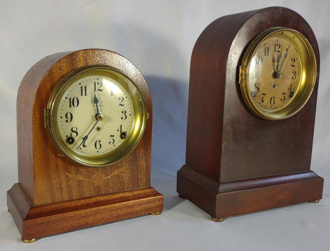 2 Seth Thomas Shelf Clocks: Untested. Larger clock has all parts in tact and pendulum swings. Clock key not included. Smaller inlaid clock needs arm for pendulum weight.