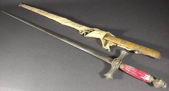 Antique Masonic Knights Templar Ceremonial Sword: An antique uniquely etched Knight's Templar ceremonial sword with scabbard and red carved handle. Both sides of the blade are etched with leaves, flowers, the cross, and the eye and pyramid. The