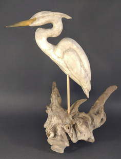 Mike & Susan Veasey Carved Great Egret Folk Art: Signed and dated Michael & Susan Veasey, 2005. Carved great egret, mounted onto driftwood. Made of recycled wood. Neck has been repaired. Stands 25" tall.