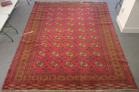 Turkmen Bokhara Rug / Carpet 11' x 8'7": Measures: 11' x 8'7". Turkoman / turkmen bokhara area carpet / rug with red, orange, black, and white color. Short fringe ends with repeating Bokhara patterns. Vintage / antique.