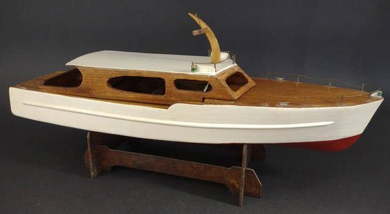 Vtg Cabin Cruiser Wooden Boat Model: Circa 1950s-60s. Hand made wooden boat model of cabin yacht with brass and metal details. Single prop. Top cabin lifts off to reveal inner hull. Appears to have elements to motorize this boat, no moto