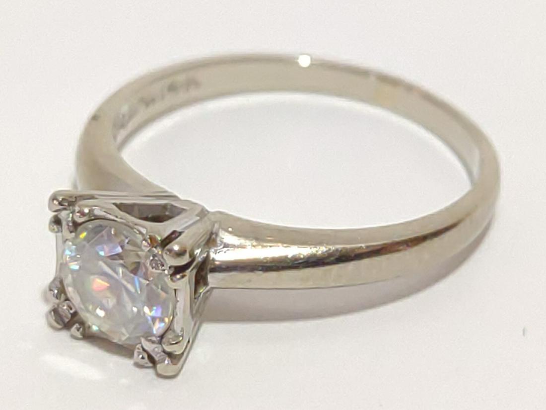 14K White Gold & Strontium Titanate Ring: Vintage 14 karat white gold with strontium titanate solitaire. Inner band is marked "14K CAPRA". Ring size: 4.75. Tested for purity. Total weight: 2.11 grams (1.36 dwt)