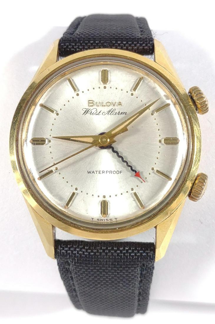 1965 Bulova Wrist Alarm Watch (Gold Plated): Vintage 1965 Bulova mens manual wrist alarm watch. Bezel gold plated. Interior of case is marked 445-1. Very good condition. Runs with no issues, and alarm works. Swiss made. 17J. 40 Microns. 34 mm ca