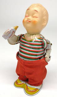 Vintage Windup 'Smarty Pants' Tin Toy (Mikuni): Vintage Japan tin wind-up mechanical toy of baby pulling pants up and down with bottle in right hand. Tested and works with no issues. Made by Mikuni.