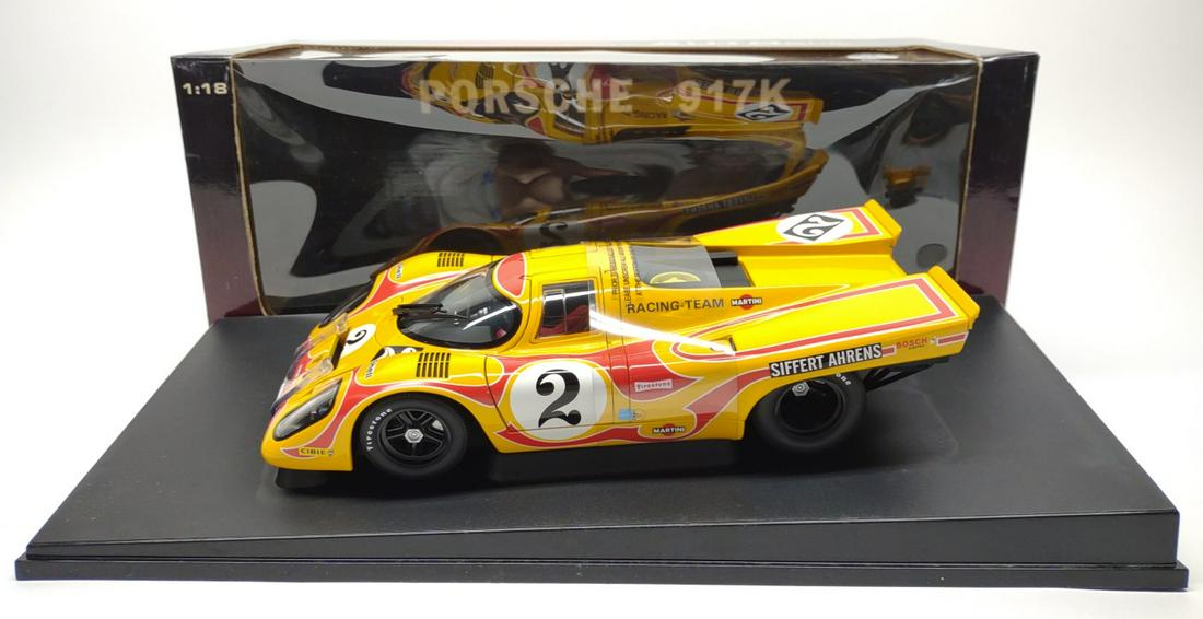 Autoart Racing Division Martini Porsche 917K Car: 1/18 scale die-cast model of Martini Racing Team Porsche 917K. Made by AUTOart models. Model reference number: 80035. Race car is in excellent condition with factory plastic still present across body.