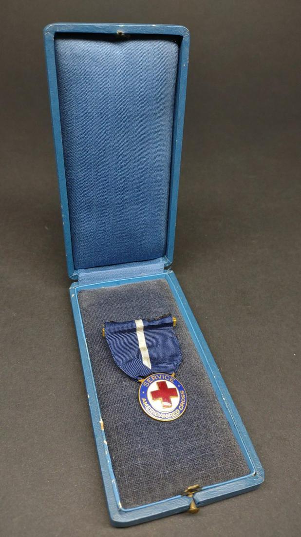 WWI Tiffany & Co Bronze Red Cross Medal: World War 1 Tiffany & Co bronze American Red Cross Service medal with blue and white ribbon and case. Backside is marked "Tiffany & Co, Bronze".