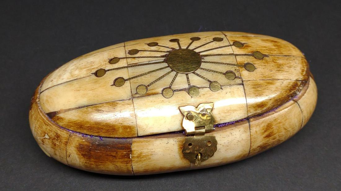 Camel Bone & Brass Inlaid Trinket Box: Vintage camel bone and brass inlaid box with purple lining and brass latch.