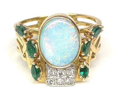 18k Opal Diamond & Emerald Ring Doug Zaruba Sz 8: Total Weight: 7.46 grams. 18 karat yellow gold with 9mm x 11mm Opal, 6 marquise cut emeralds, and 6 round cut diamonds (0.09 CTW). Crafted and signed by Douglas Zaruba of Hagerstown, Maryland. Dated