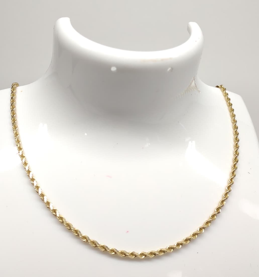 14k Yellow Gold Rope Chain Necklace (7.96g): Total Weight: 7.96 grams. 14 karat yellow gold twist rope chain necklace. 16" long. Marked 'Aurafin 14K'. Tested for purity.