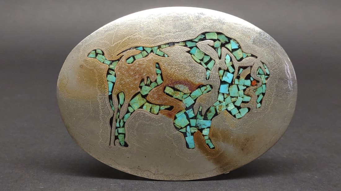 Inlaid Turquoise & Nickel Belt Buckle: Vintage nickel inlaid turquoise and coral belt buckle with buffalo design. Western style. Backside is marked with bend arrow makers mark.