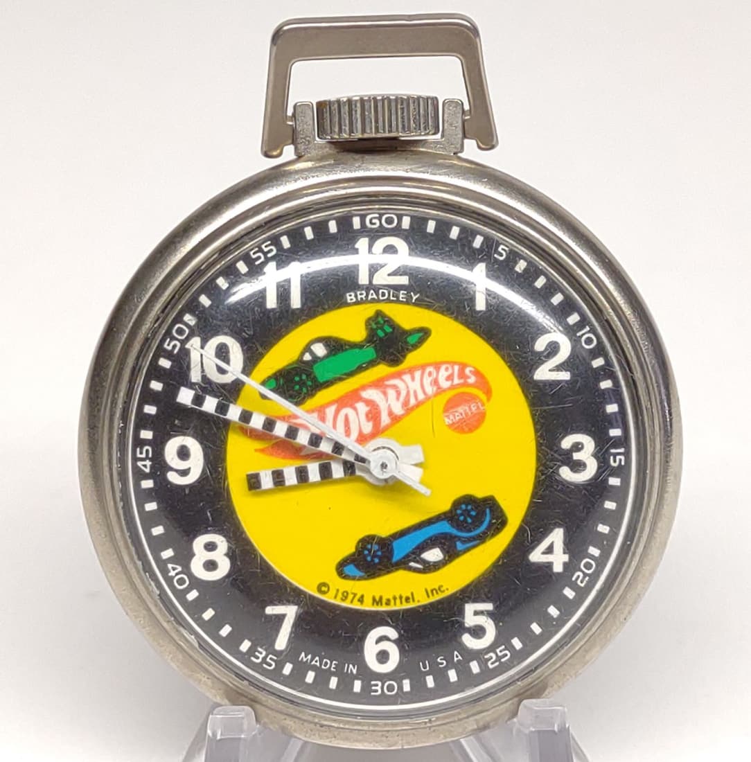 1974 Hot Wheels Bradley Pocket Watch (Works): Vintage 1974 Mattel Hot Wheels Bradley manual wind pocket watch. Tested and works. Made is USA.