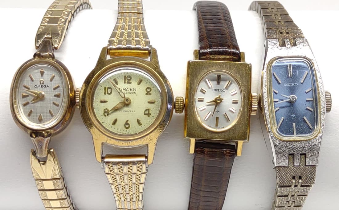 4 Vintage Ladies Manual Wind Watches (Works): 4 ladies manual wind wrist watches. Includes (2) Seiko, Omega, and Gruen. All four have been tested and are in running condition.