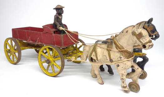 Kenton Horse Drawn Cast Iron Farm Wagon: An early Kenton two horse drawn farm wagon with black driver. Marked Kenton Toys made in usa. 15" in length.