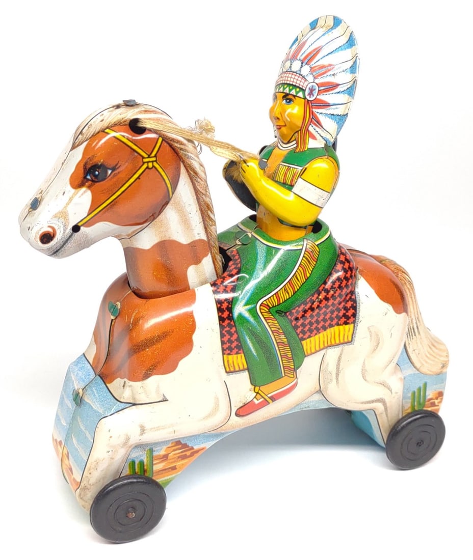 Japan Tin Galloping Indian Friction Toy: Vintage friction powered tin litho 'Galloping Indian' on horse toy. Working condition with horses head nodding as toy moves forward. Made by TT (Takatoku), Japan.