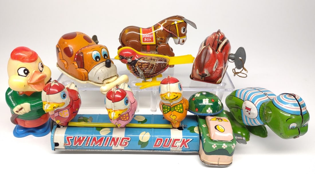 7 Japan Wind-Up Tin Litho Toys (1 of 11)