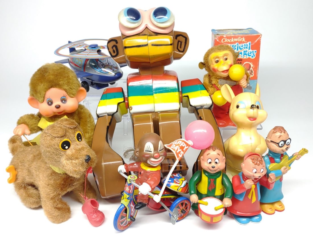 Vintage Hong Kong & Korea Wind-Up Toys: A mixed group of vintage hong kong and korea made mechanical wind up toys. Includes musical monkey with maracas in original box. All are in working condition.