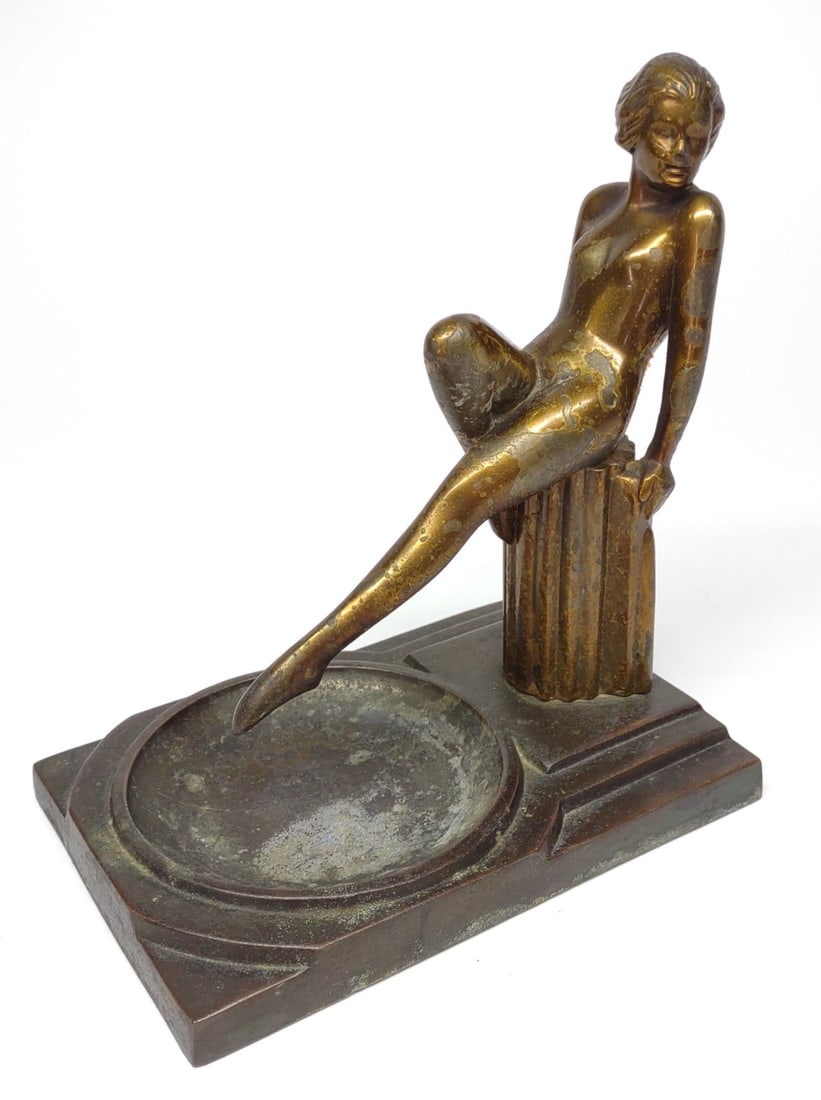 Art Deco Figural Nude Female Ashtray: A vintage, art deco era (early 1900s) figural metal ashtray of nude female. In the style of Frankart. No makers marks present.