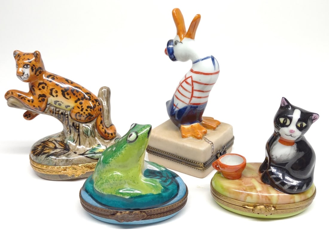 4 Limoges Porcelain Figural Animal Pill Boxes: All four are marked limoges france, peint main. Some are initialed with artist / painter. Includes jaguar laying in tree, frog, goose dressed as sailor, and cat sitting next to bowl. All are in excell