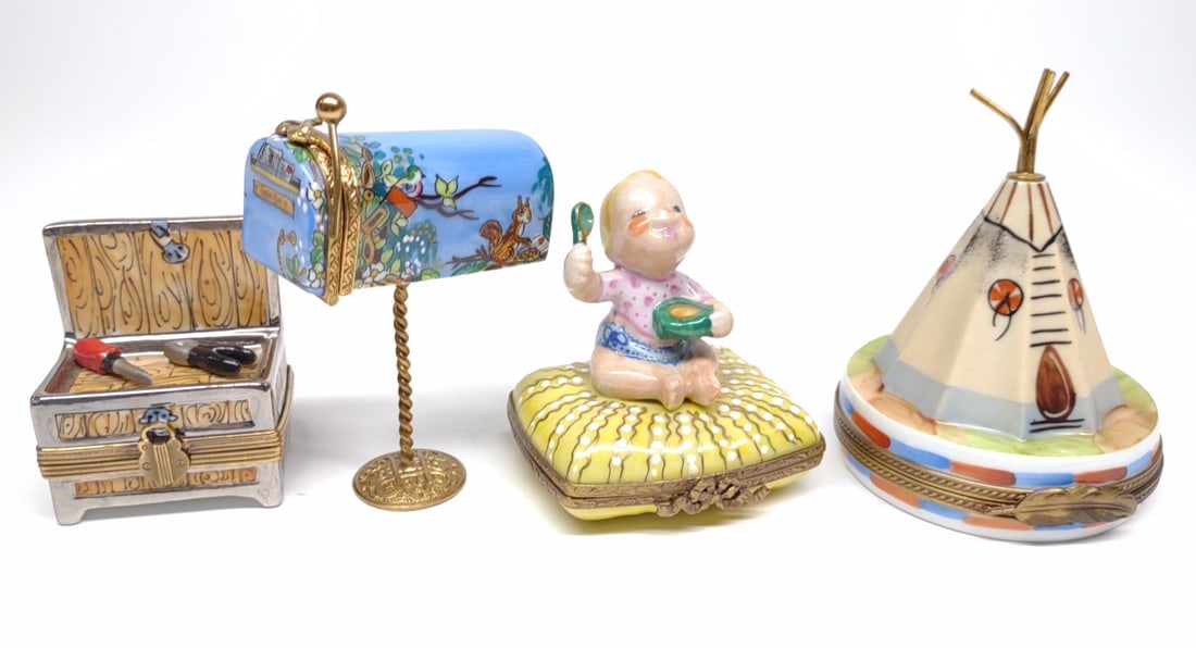 4 Limoges Porcelain Figural Pill Boxes: A group of 4 unique limoges porcelain figural pill boxes. All are marked Limoges france with artist initials. includes Teepee, baby eating, tool box/chest, and mailbox. All are in excellent condition.