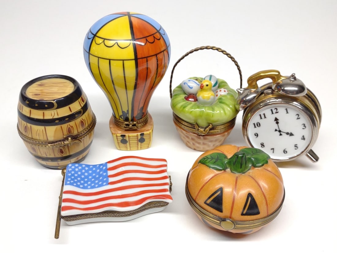 6 Limoges Porcelain Figural Pill Boxes: A group of porcelain limoges france hand painted pill boxes. All are marked Limoges france. Some are marked with painters initials. includes holiday pill boxes, hot air balloon, barrel, and alarm cloc