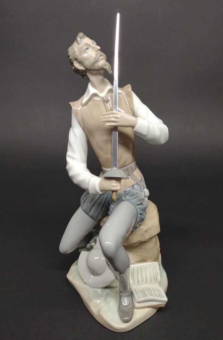 Lladro Oration Quixote #5357 Porcelain Figurine: Lladro #5357 Oration (Man with sword). Makers mark on underside. Excellent condition. In-house international shipping NOT available for this item. UPS third party or private arrangement only.