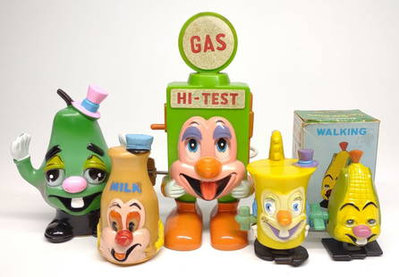 5 Marx Marxie Comic Character Toys: A group of 5 vintage Marxie comic character toys. By Marx. Includes Corkie corn windup toy with box, gas pump, milk, saxophone, and pear. All are in working condition.