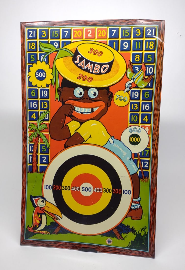 Wyandotte Sambo Target Tin Game Board: Vintage, 1930s, tin litho black americana Sambo target dart board by wyandotte. Includes original metal stand.