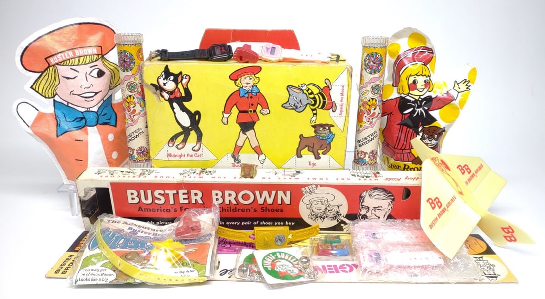 Buster Brown Advertising Toys: A group of vintage buster brown novelty toys. Includes watches, kaleidoscopes, hand puppets, flicker and whistle rings, and more.
