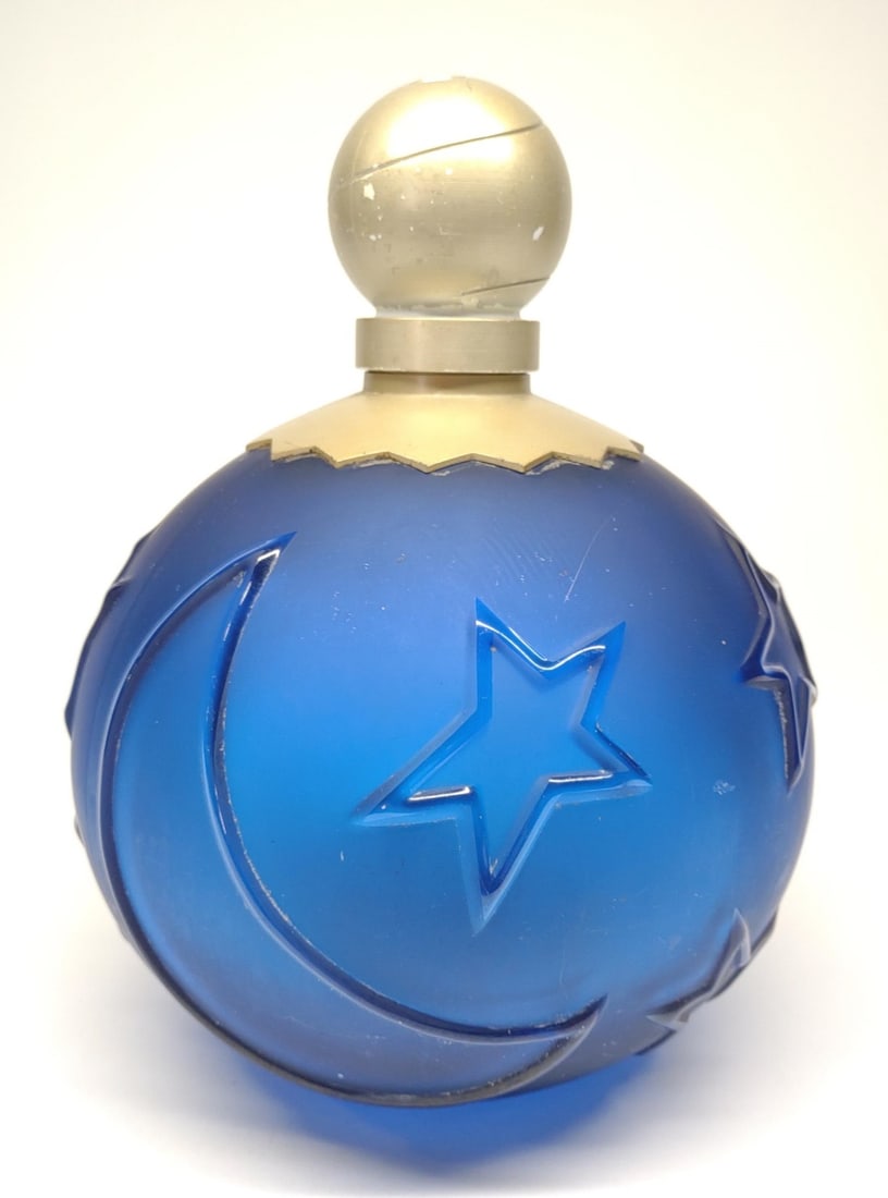 Large Karl Lagerfeld Factice Perfume Bottle: A large Karl Lagerfled " Sun Moon & Stars " dummy factice advertising store display perfume bottle. Bottle is made of glass and measures 10" Tall. Contents not included.In-house International shipping