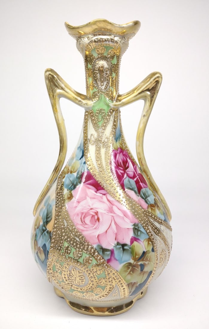Nippon Beaded Floral Rose Painted Vase: Antique, circa late 19th/early 20th century, hand painted porcelain Japan Nippon double handled long ruffled necked vase. Featuring pink rose flowers with thick gold linework and raised beading throug