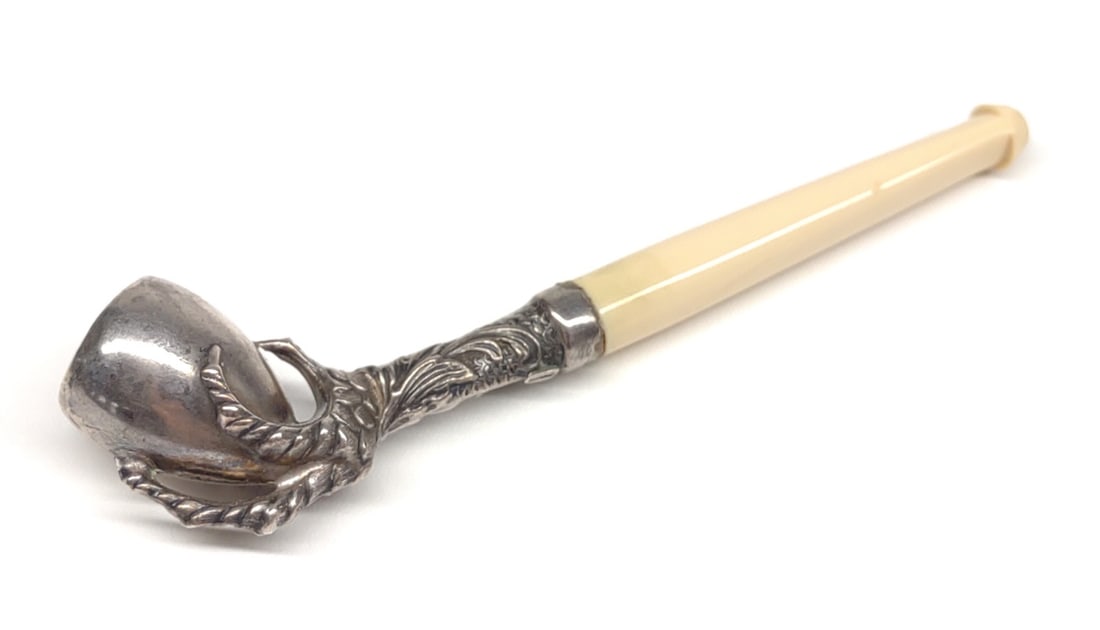 Antique .800 Silver Claw Smoking Pipe: Antique .800 silver figural bird / dragon claw pipe. Includes carved bone stem. Marked "800". Measures 3.25" long. Weighs 6.09g. Tested for purity.