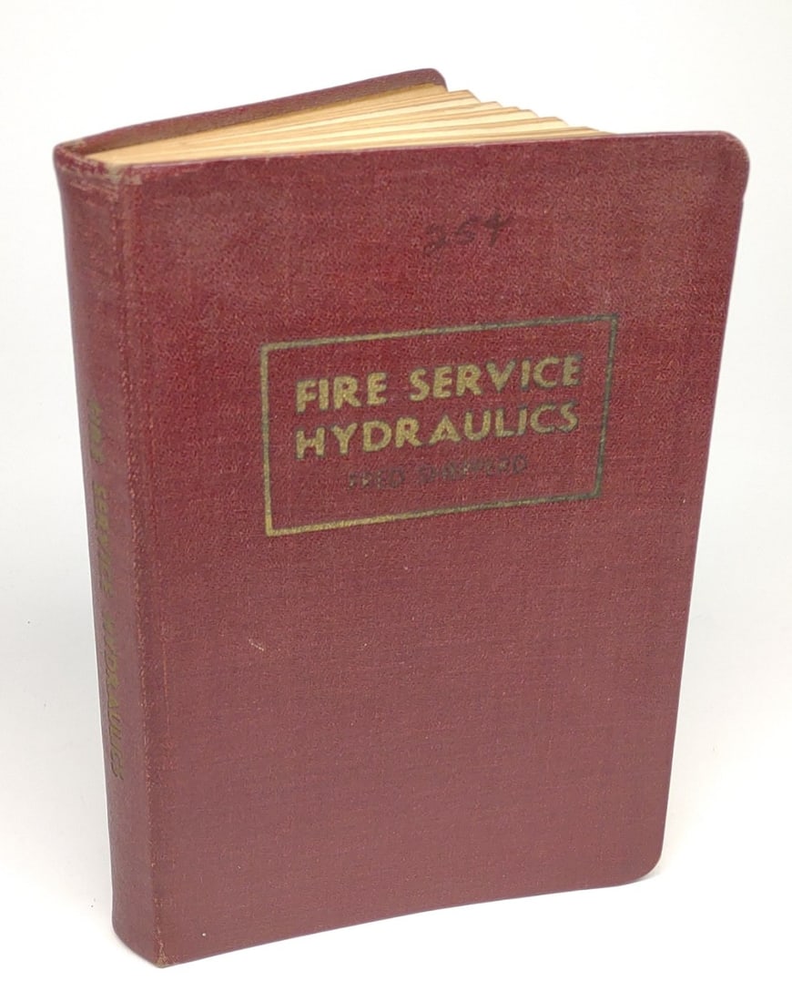 1941 Fire Service Hydraulics Book by Fred Shepperd: A vintage, 1941, Fire Service Hydraulics manual by Fred Shepperd. Inner cover is stamped with previous owner, The Extinguisher Service, Annapolis, Maryland.