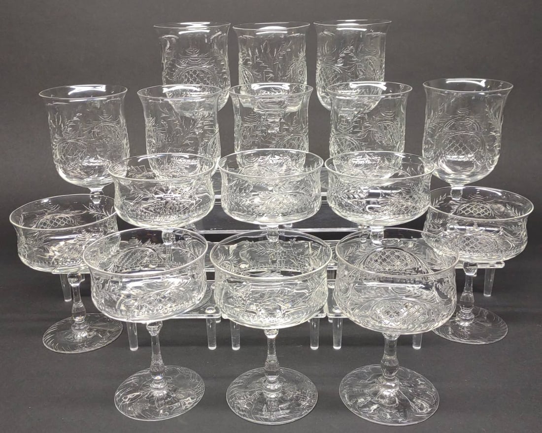 16 pc Thomas Webb Signed Crystal Stemware Set: Antique 16 piece signed Thomas Webb cut crystal stemware set. Including: (8) wine glasses, and (8) champagne glasses. All in good condition with no chips or cracks except 1 wine glass has small chip t