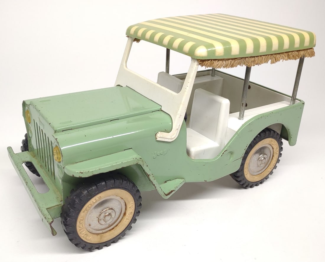Tonka #350 Surrey Green Pressed Steel Toy Jeep: Vintage 1960's pressed steel pink Tonka #350 Surrey Jeep toy car. Tonka makers mark located on rear. Measures approximately 9.75" long.