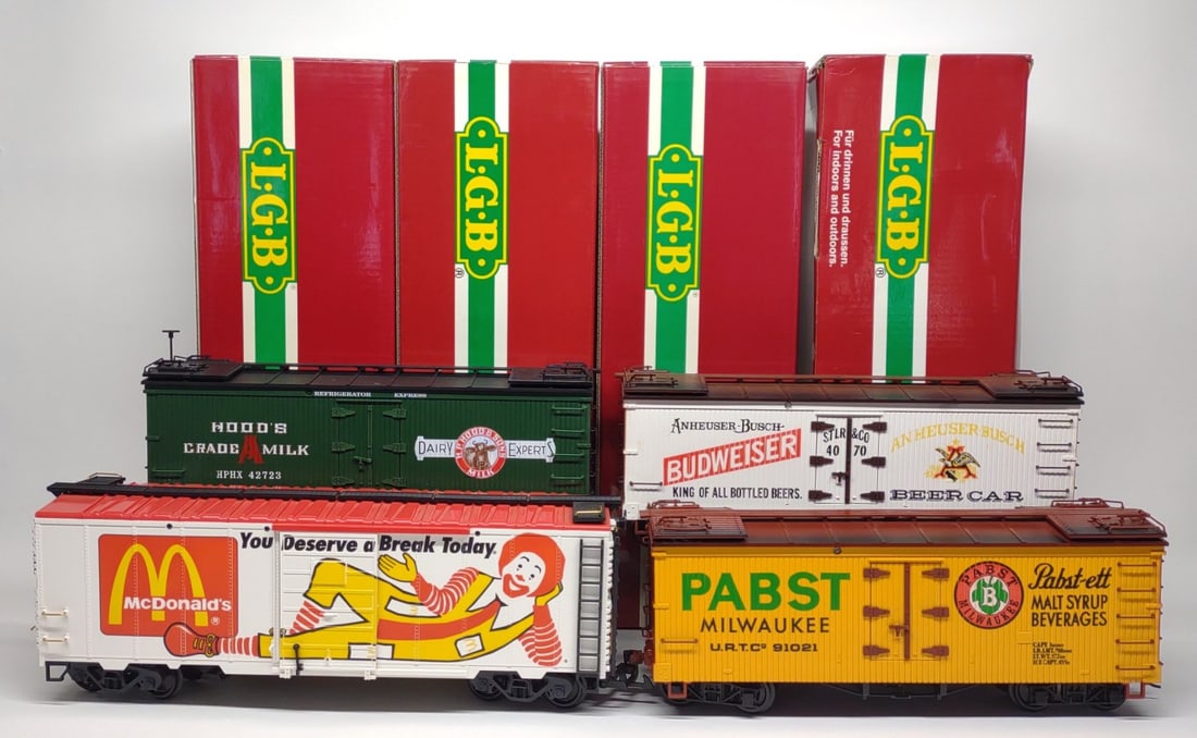 (4) LGB G Scale Toy Trains w/ Boxes: (4) LGB G scale toy trains with original boxes including (1) 42723 Refrigerator Car, (1) 4070 Budweiser Reefer, (1) 4074 Pabst Reefer, and (1) 44910 McDonalds Freight Car.