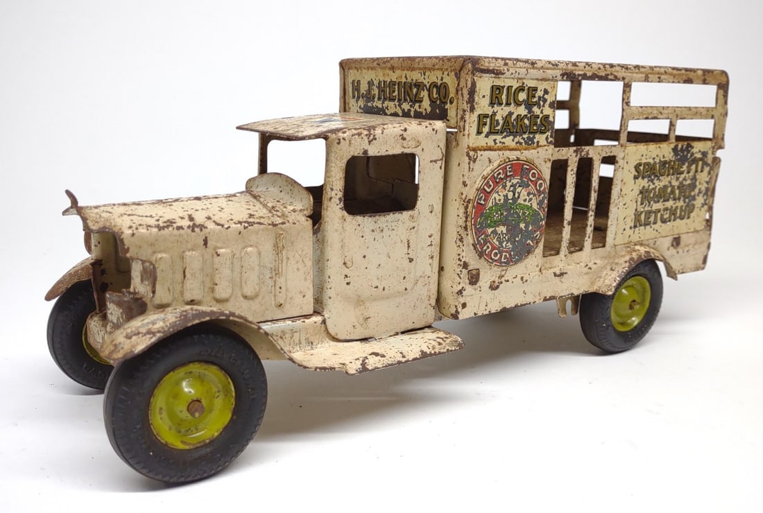 1930s Metalcraft H. J. Heinz Co. Delivery Truck: Vintage, 1930s, Metalcraft Corp H. J. Heinz Co. Pure Food Products delivery truck toy. Pressed steel. Underside is stamped Metalcraft Corp, Made in USA. Measures approximately 11.5" long.